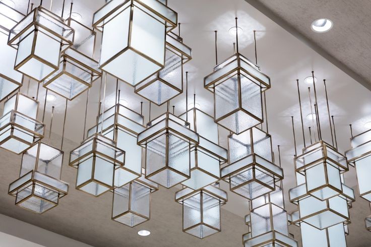 Elevate Your Designs with Custom Glass and Metal Lighting Installations