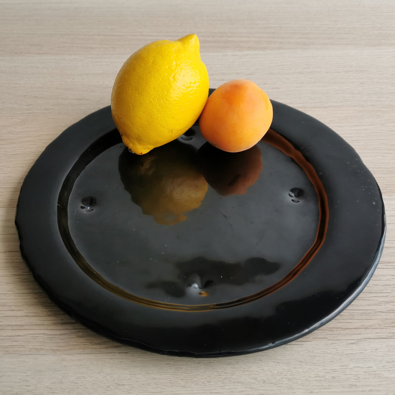 City Minimalist Black Glass Plate. Black Glass Shifted Center Plate - 9 7/16" (24cm.)